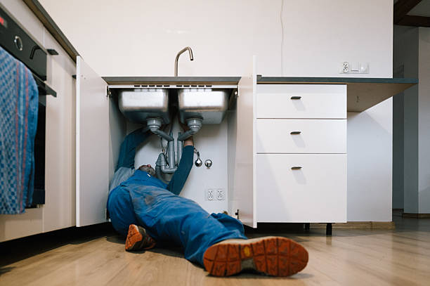 Professional Emergency Plumber technician working in Huntersville, NC
